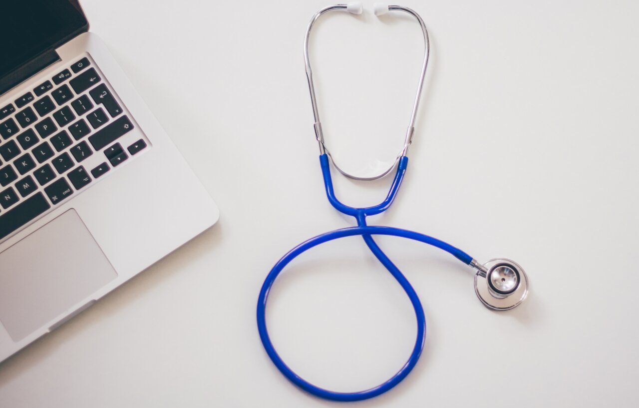 stethoscope & laptop - healthcare & digitalization.