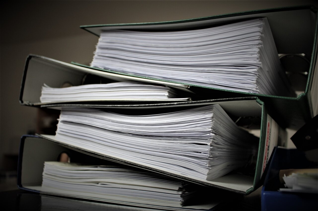 Folders full of public administration files.