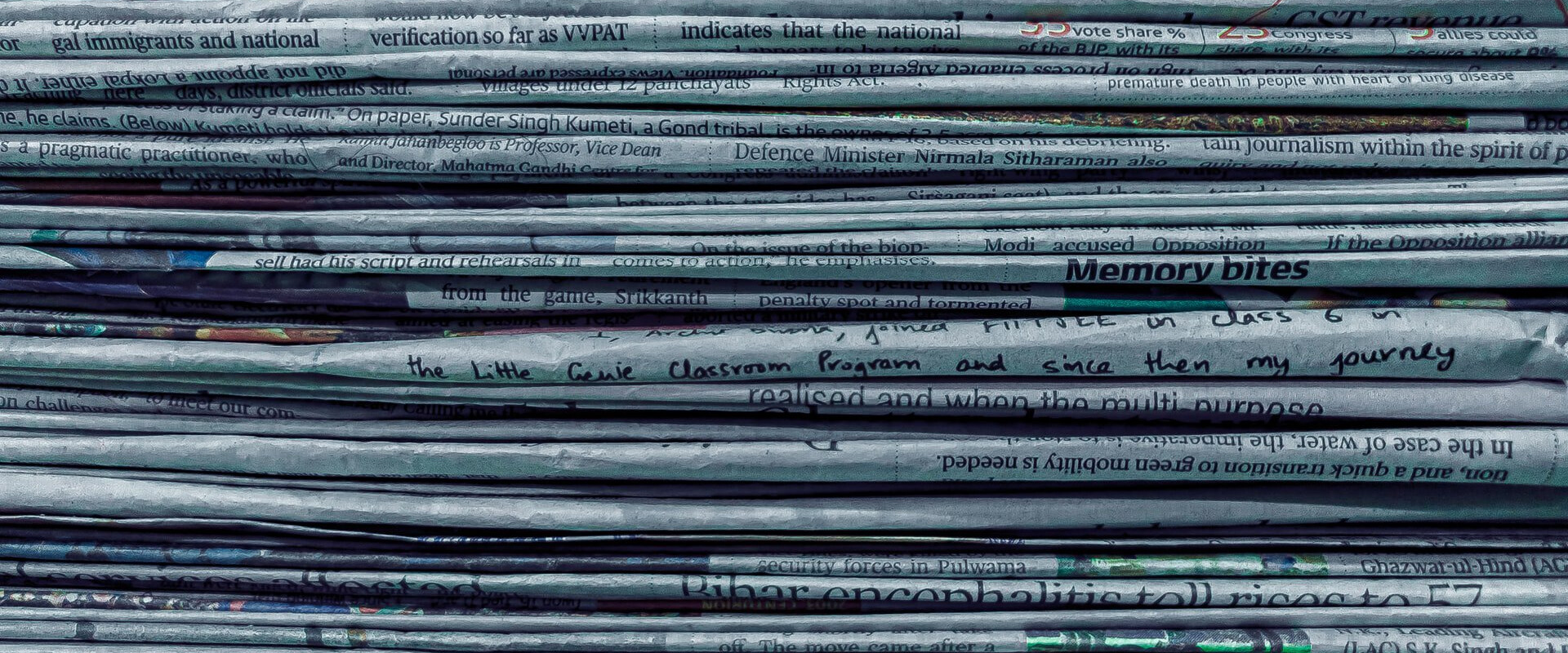 Stack of news articles